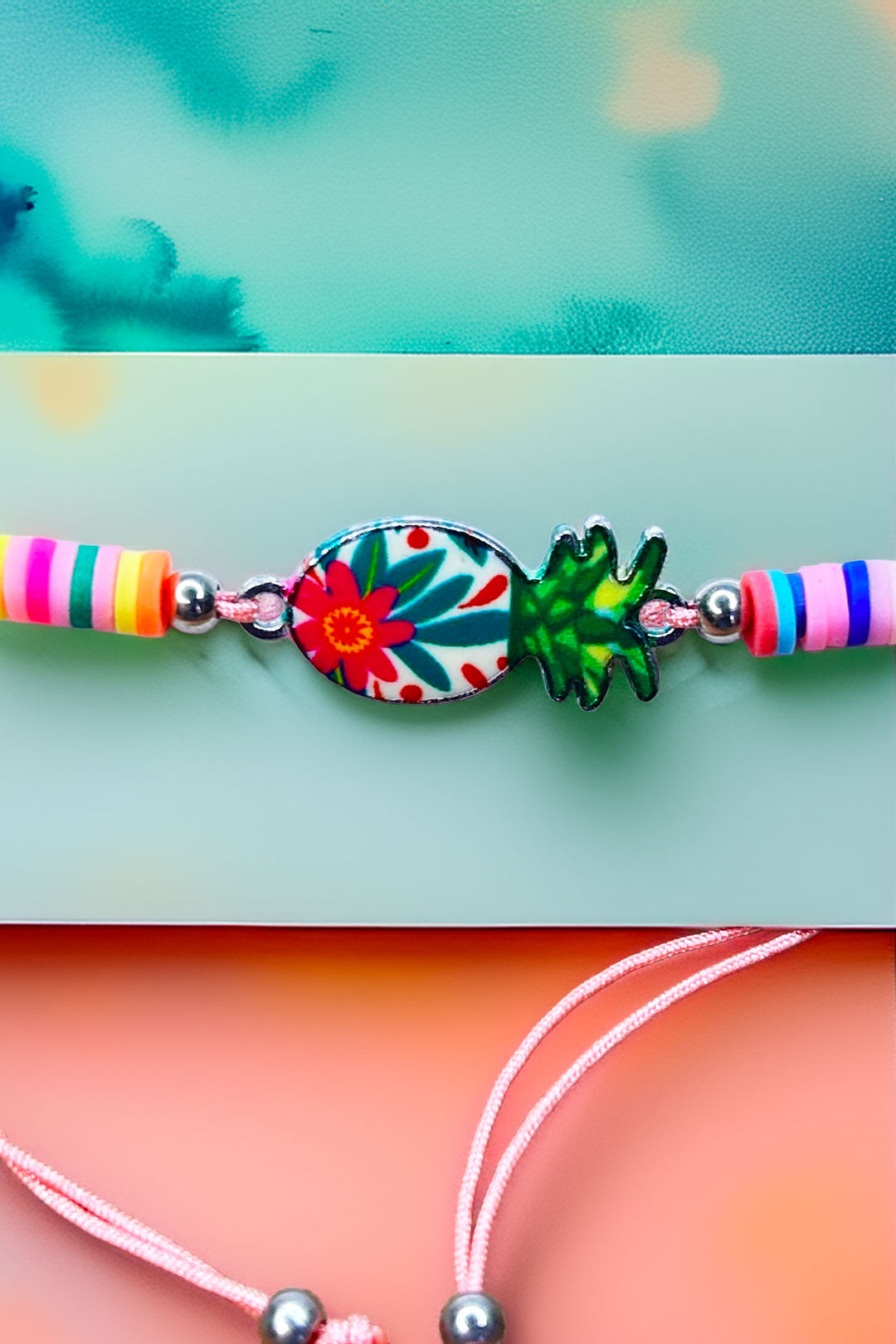 Close-up of colorful pineapple friendship bracelet with beads