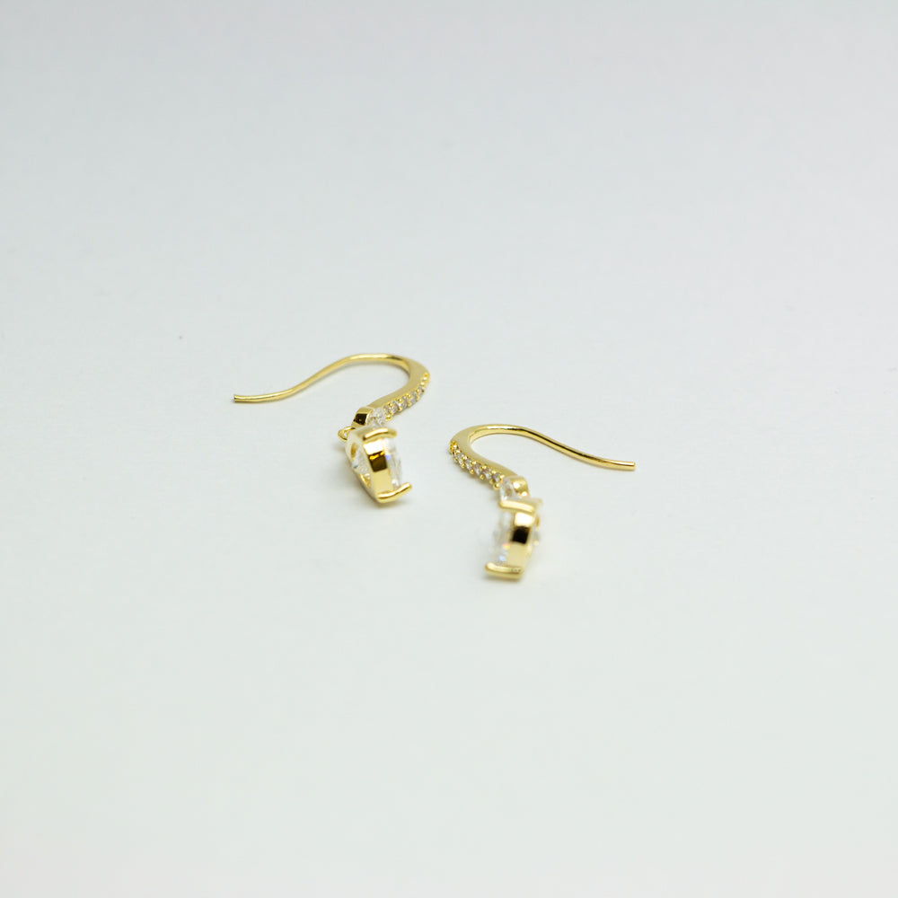 Gold dangle earrings with crystal accents - main view