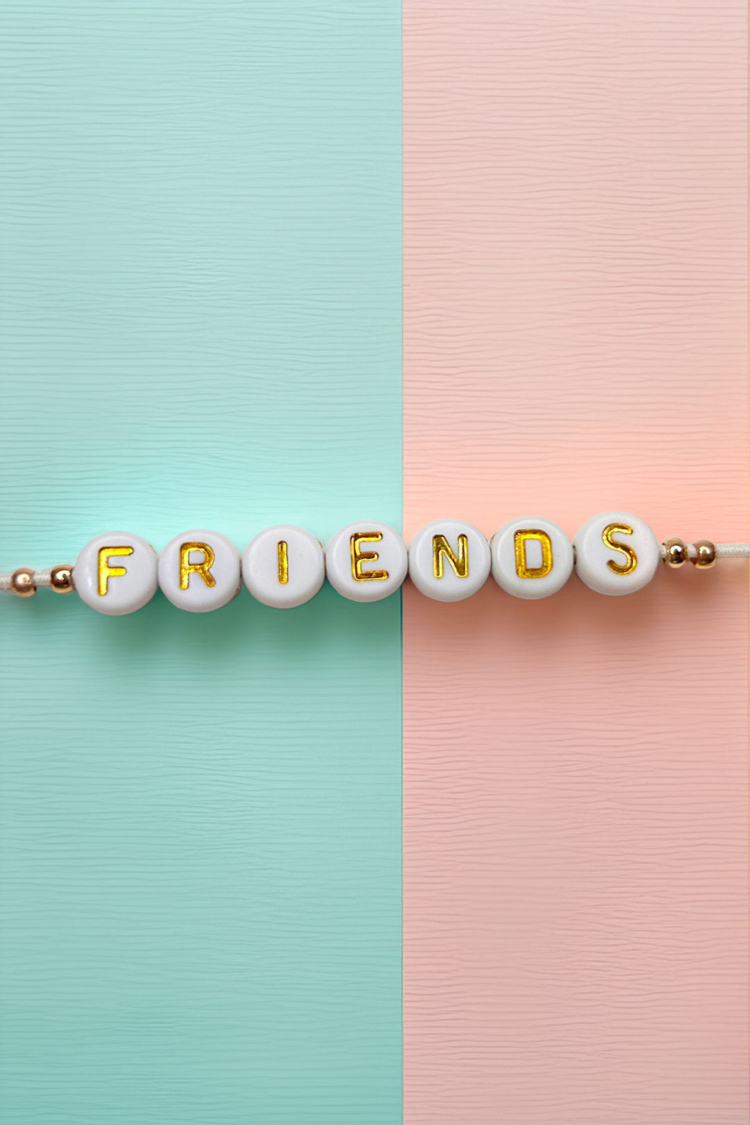 Top view of Friendship Bracelet with 'FRIENDS' in gold letters