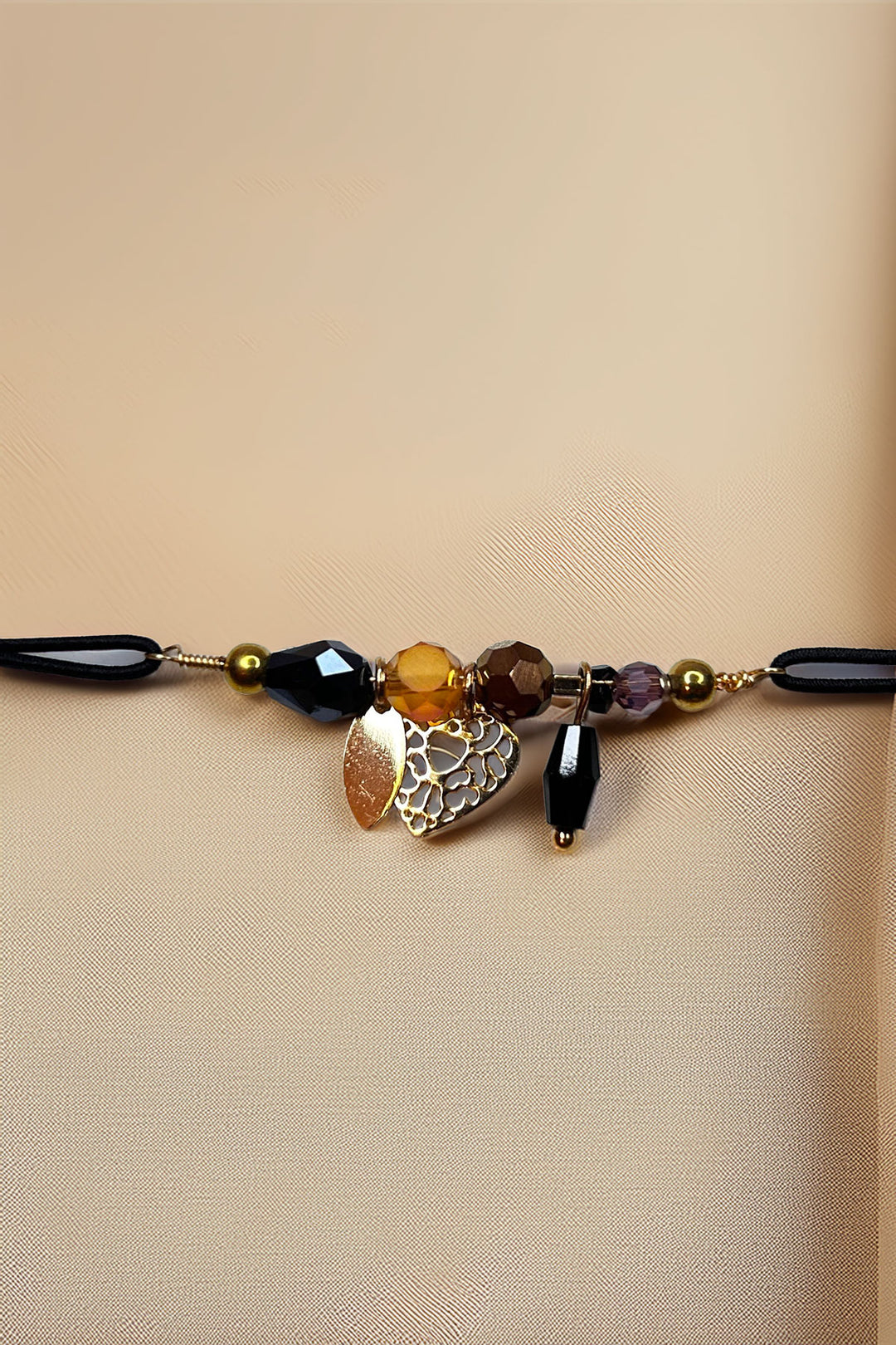 Boho charm bracelet with assorted beads and charms