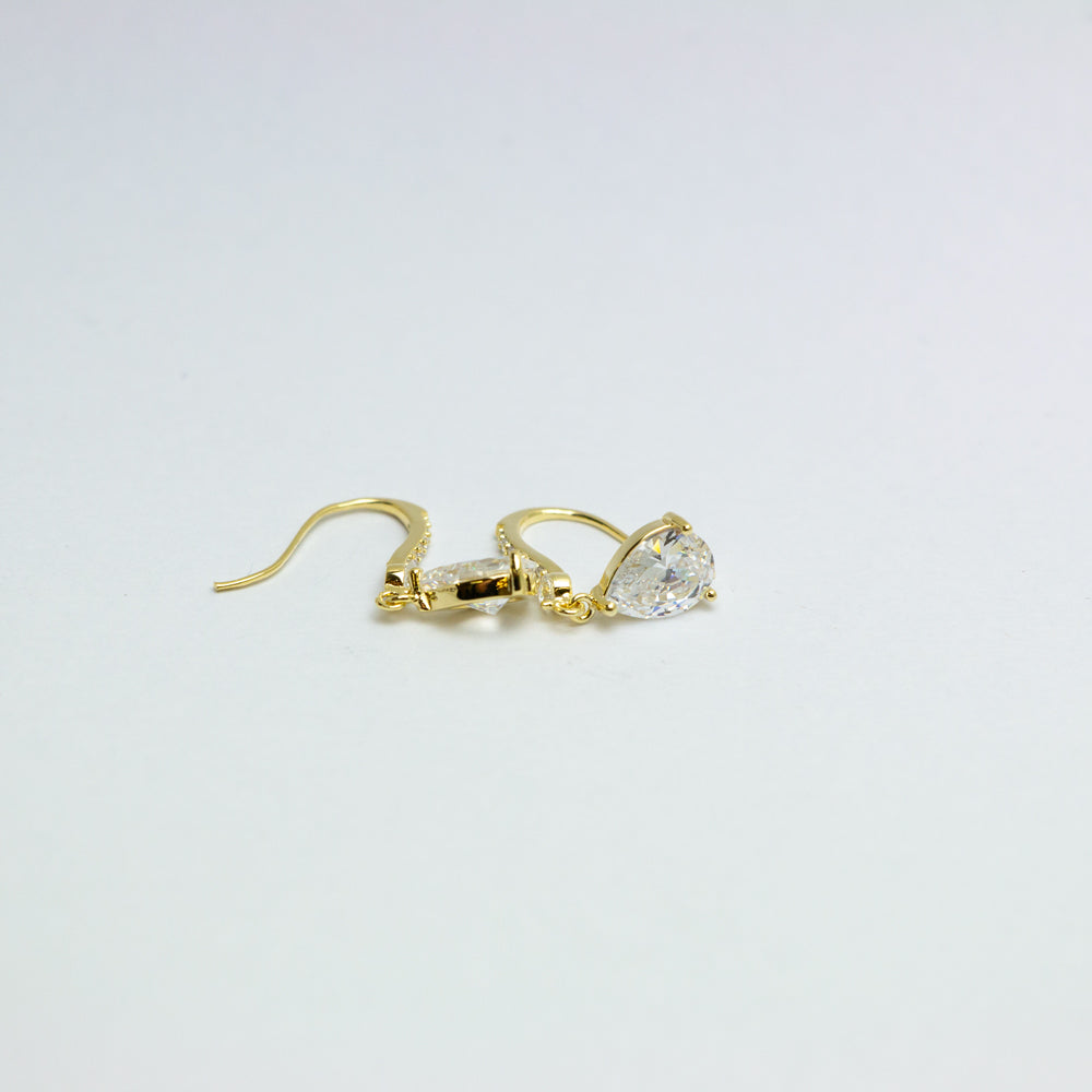 Gold dangle earrings with crystals - side angle