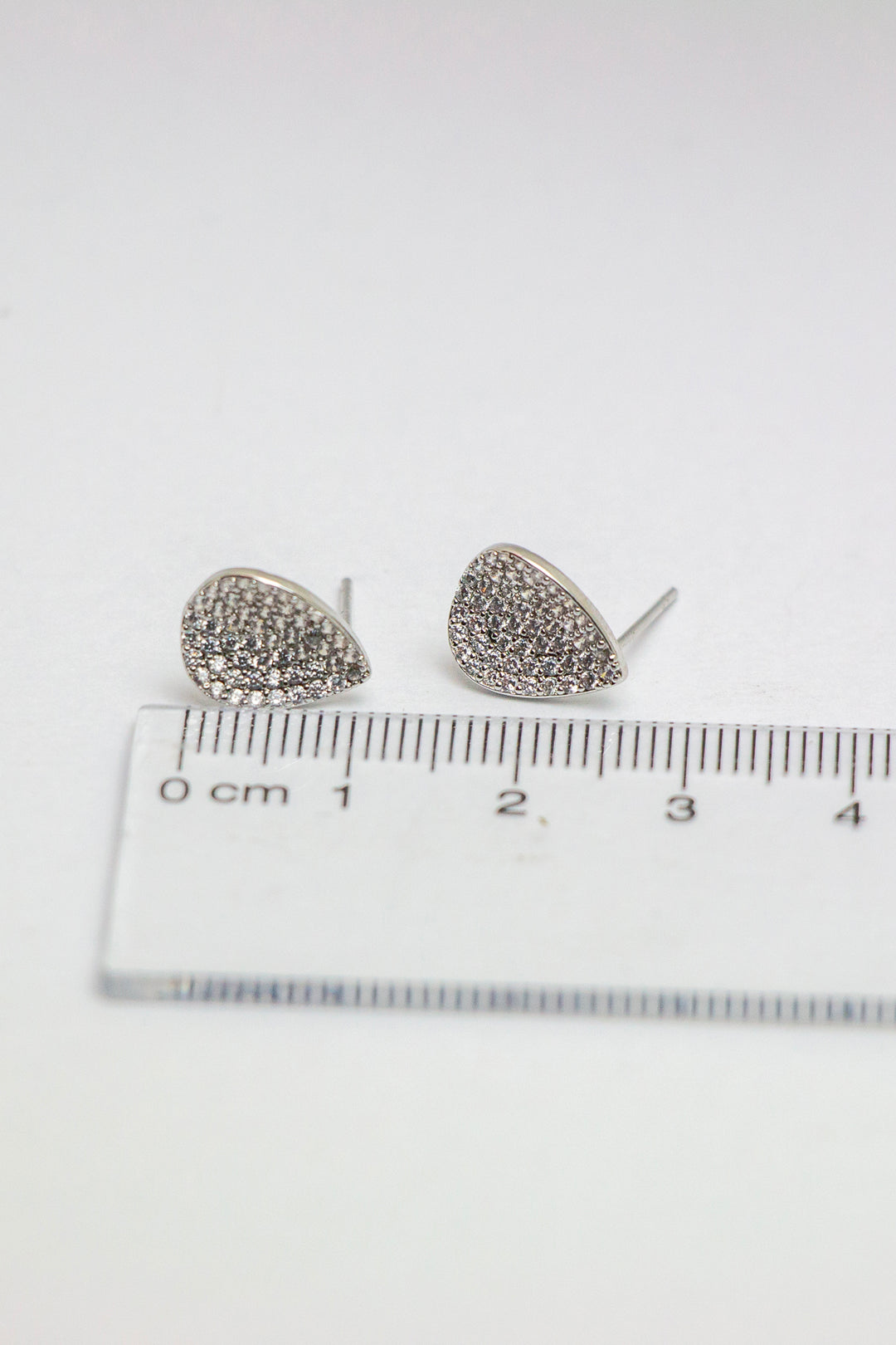 Teardrop earrings with size reference