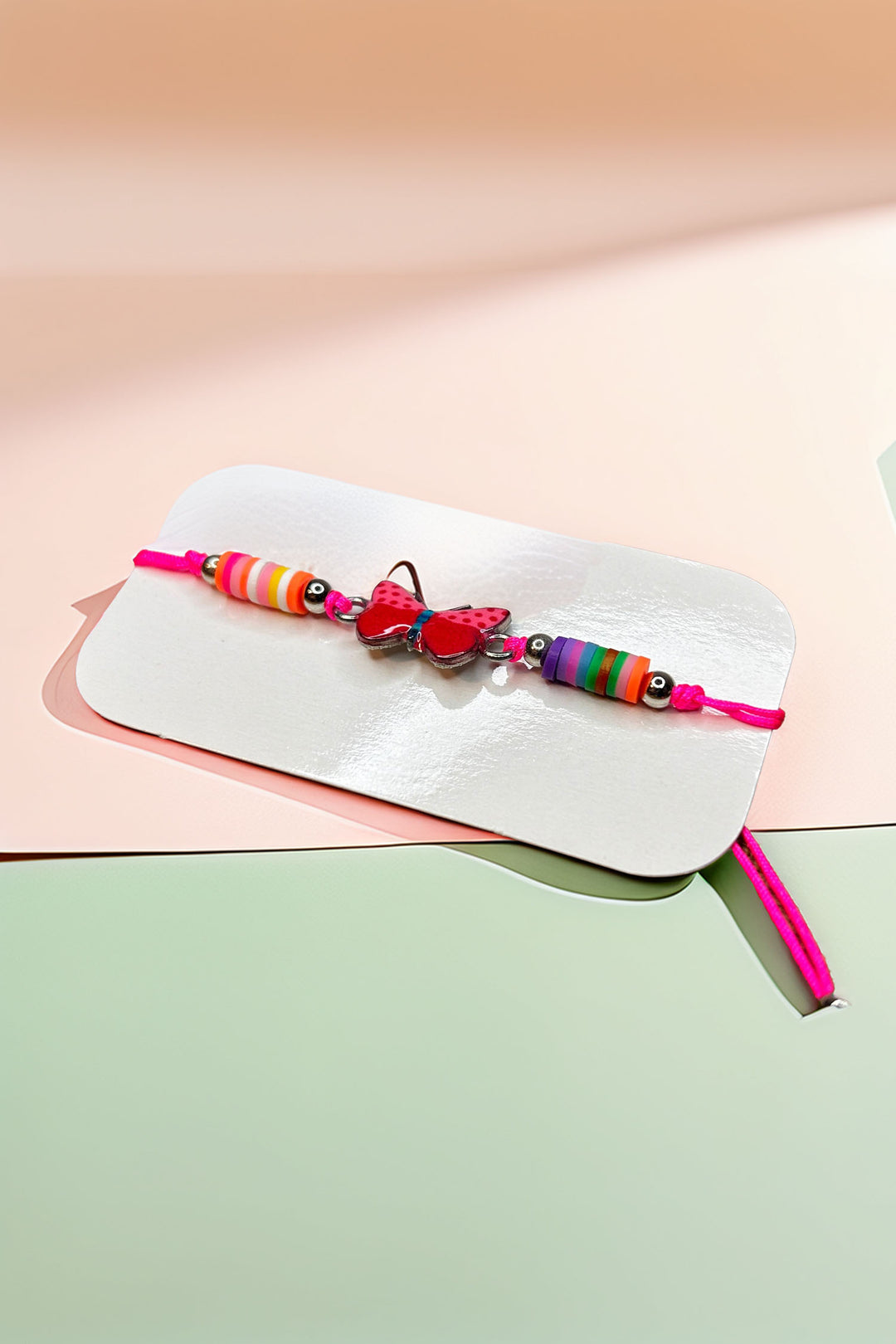 Colorful butterfly bracelet on soft backdrop