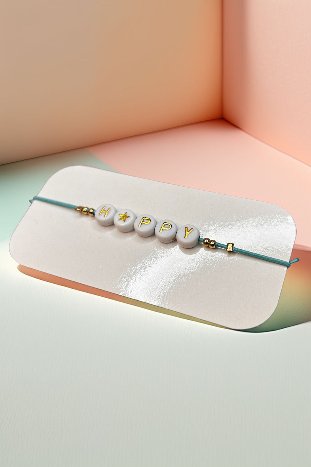 Front view of Happy bead bracelet