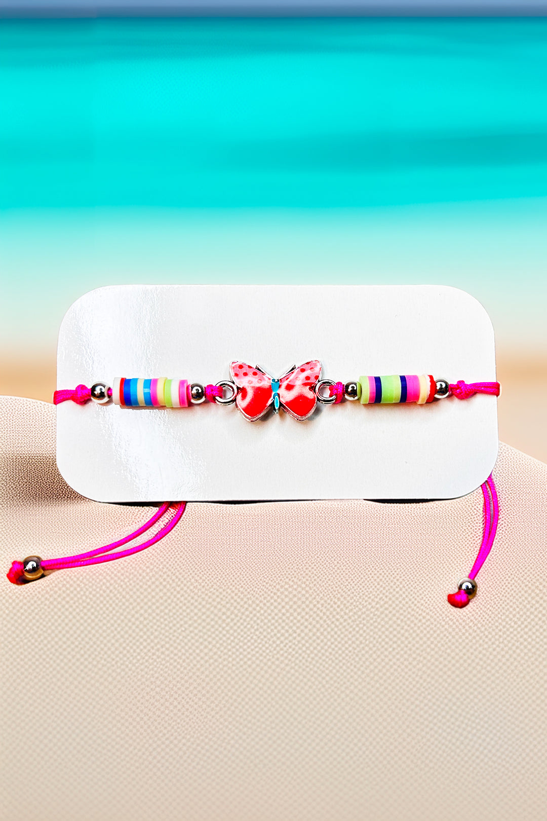 Butterfly charm bracelet with colorful beads