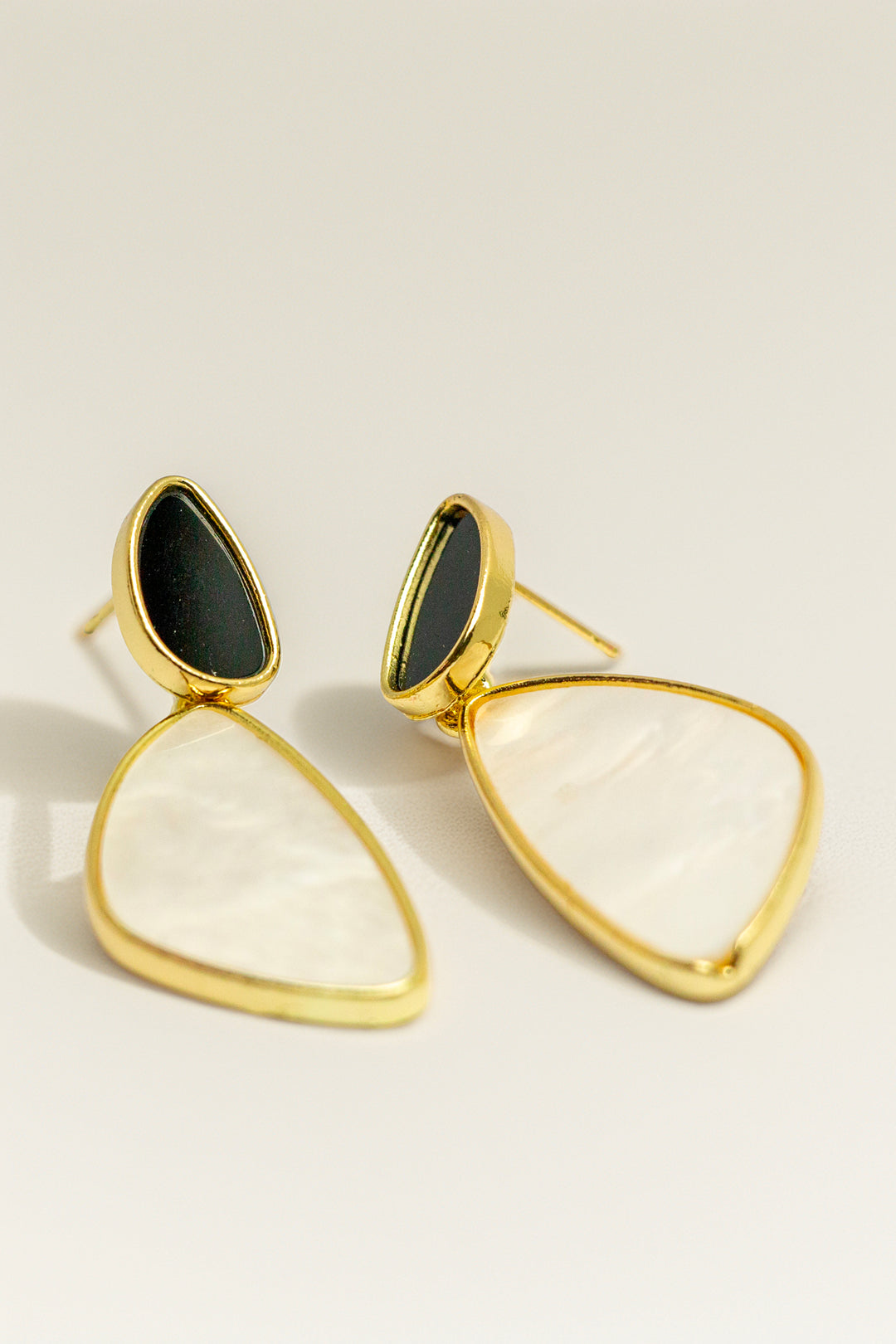 Close-up of gold earring texture and design