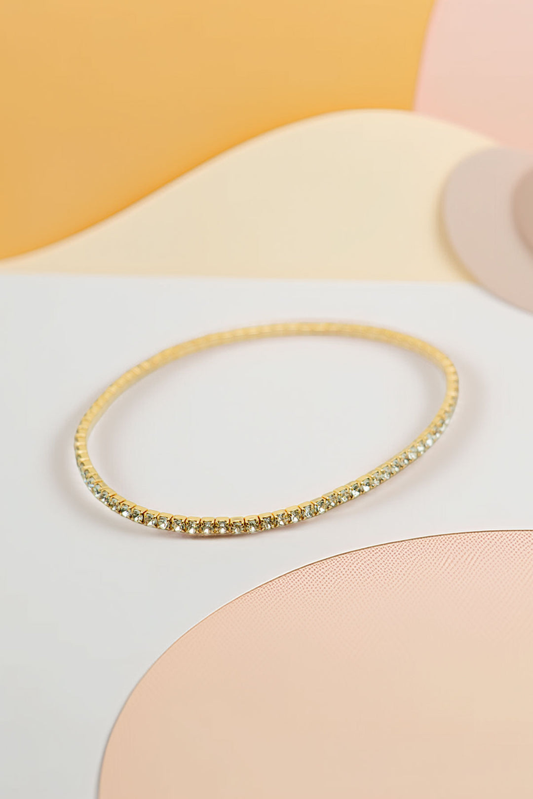 Single rhinestone bracelet on white background