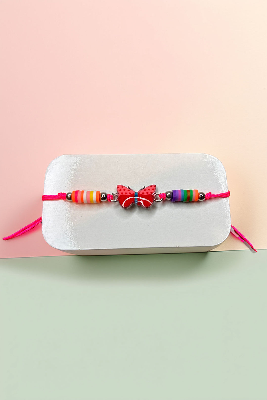 Butterfly bracelet with colorful beads on card