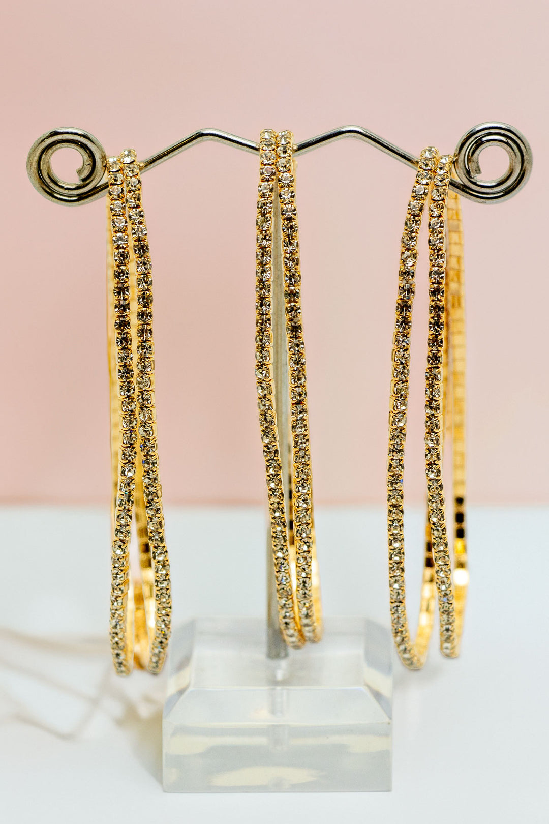 Rhinestone bracelet on pink background