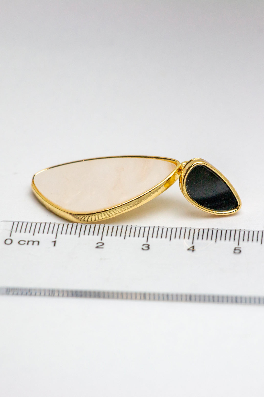 Earring size comparison with ruler