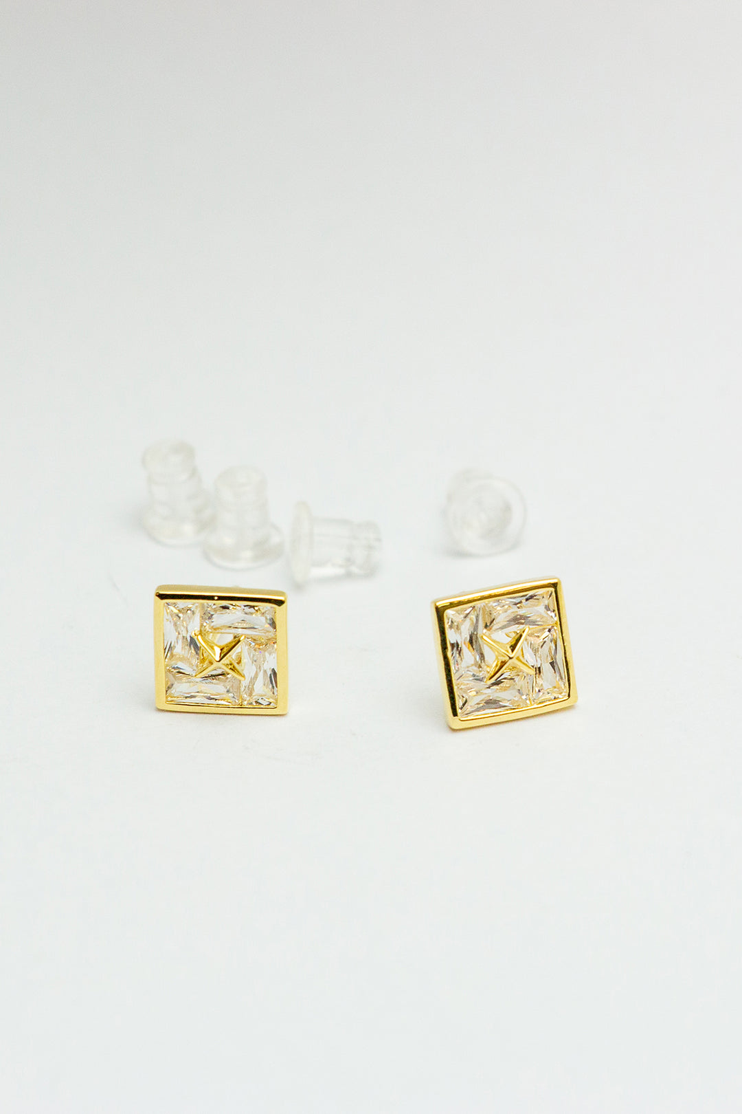 Pair of earrings with additional backings