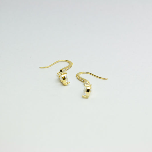 Gold dangle earrings with crystal accents - main view