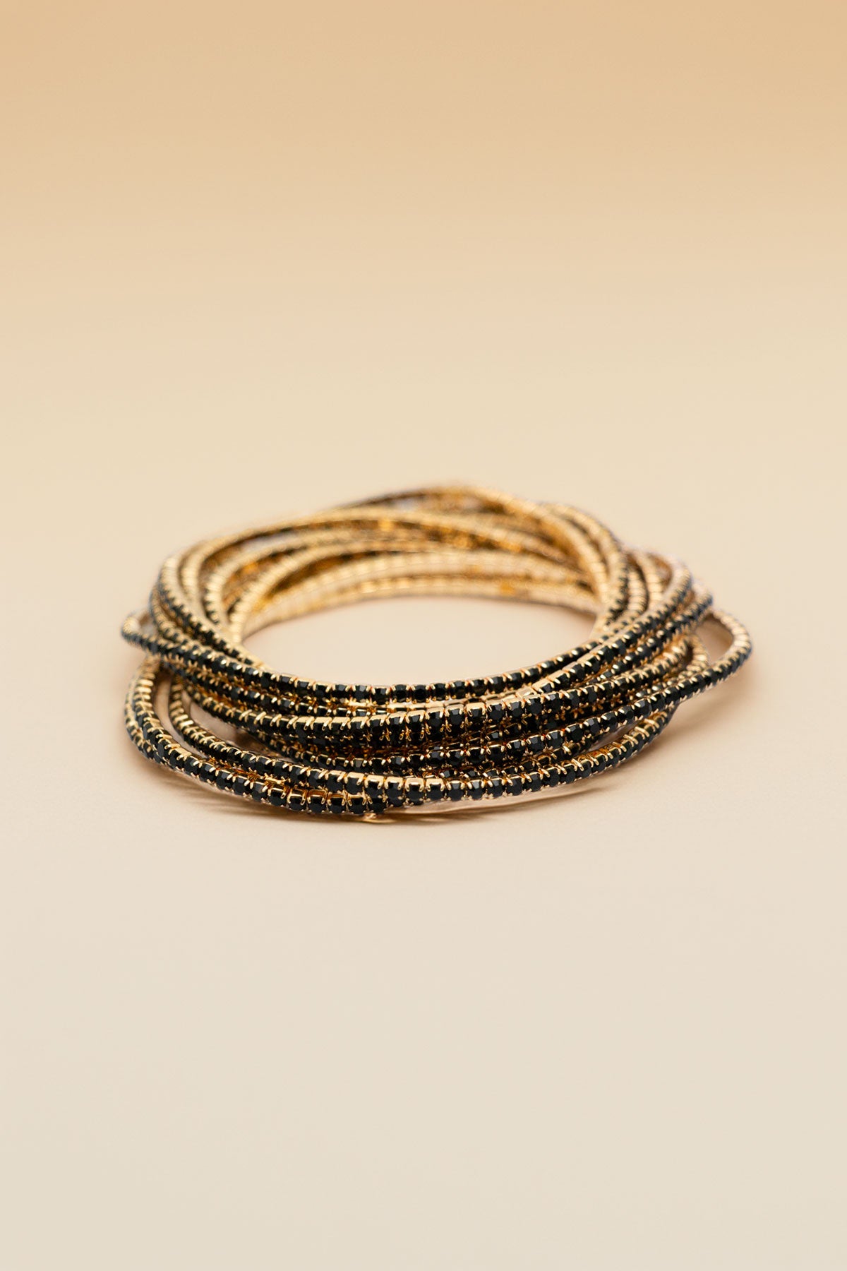 Set of 12 gold-tone rhinestone bracelets