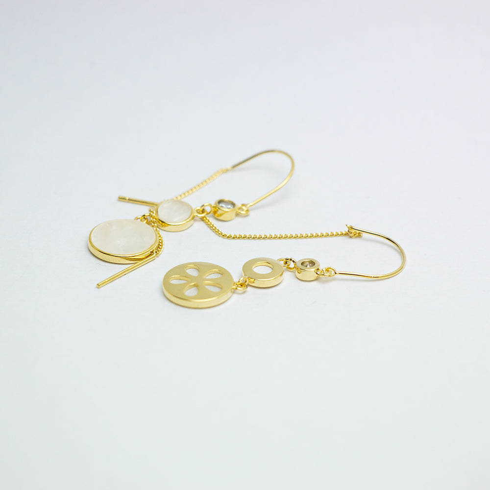 Main view of elegant gold drop earrings with circular designs
