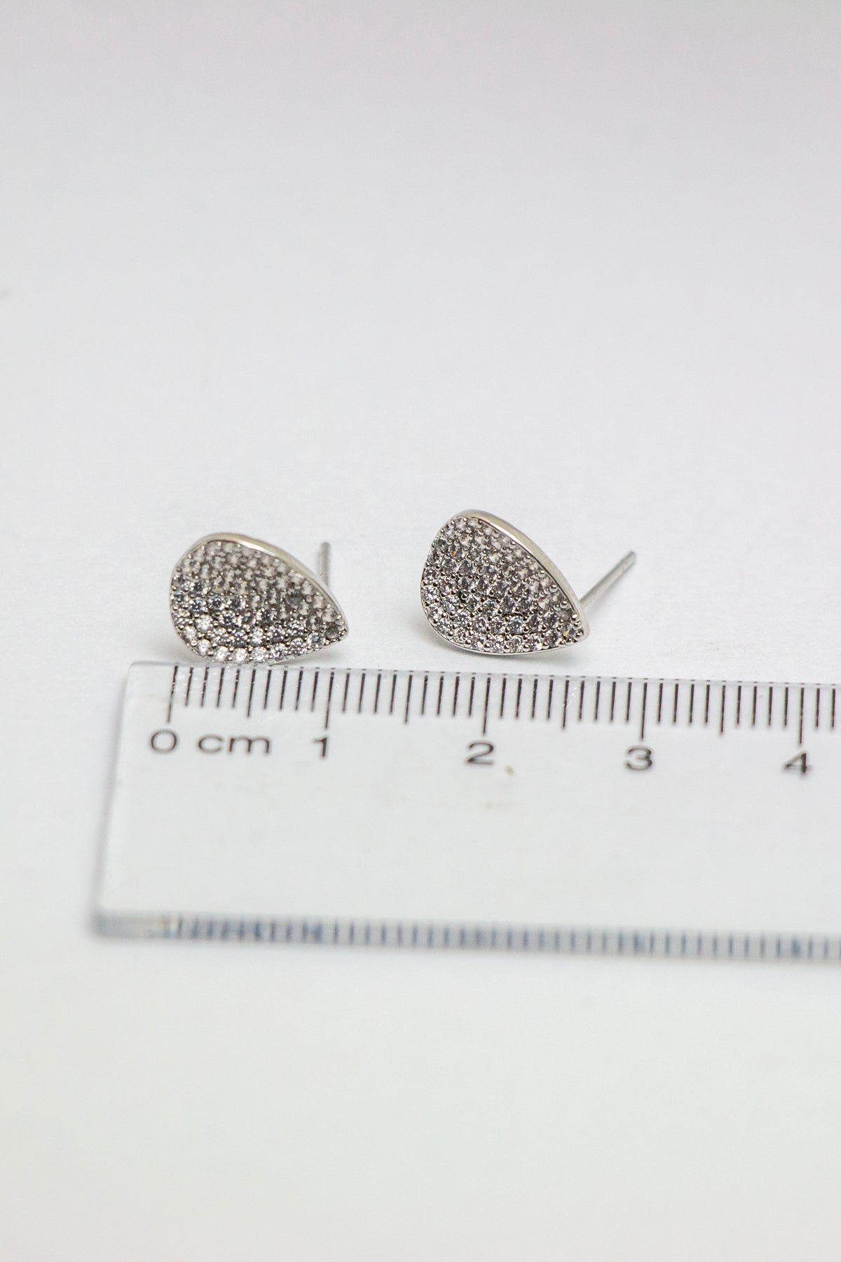 Teardrop earrings with size reference