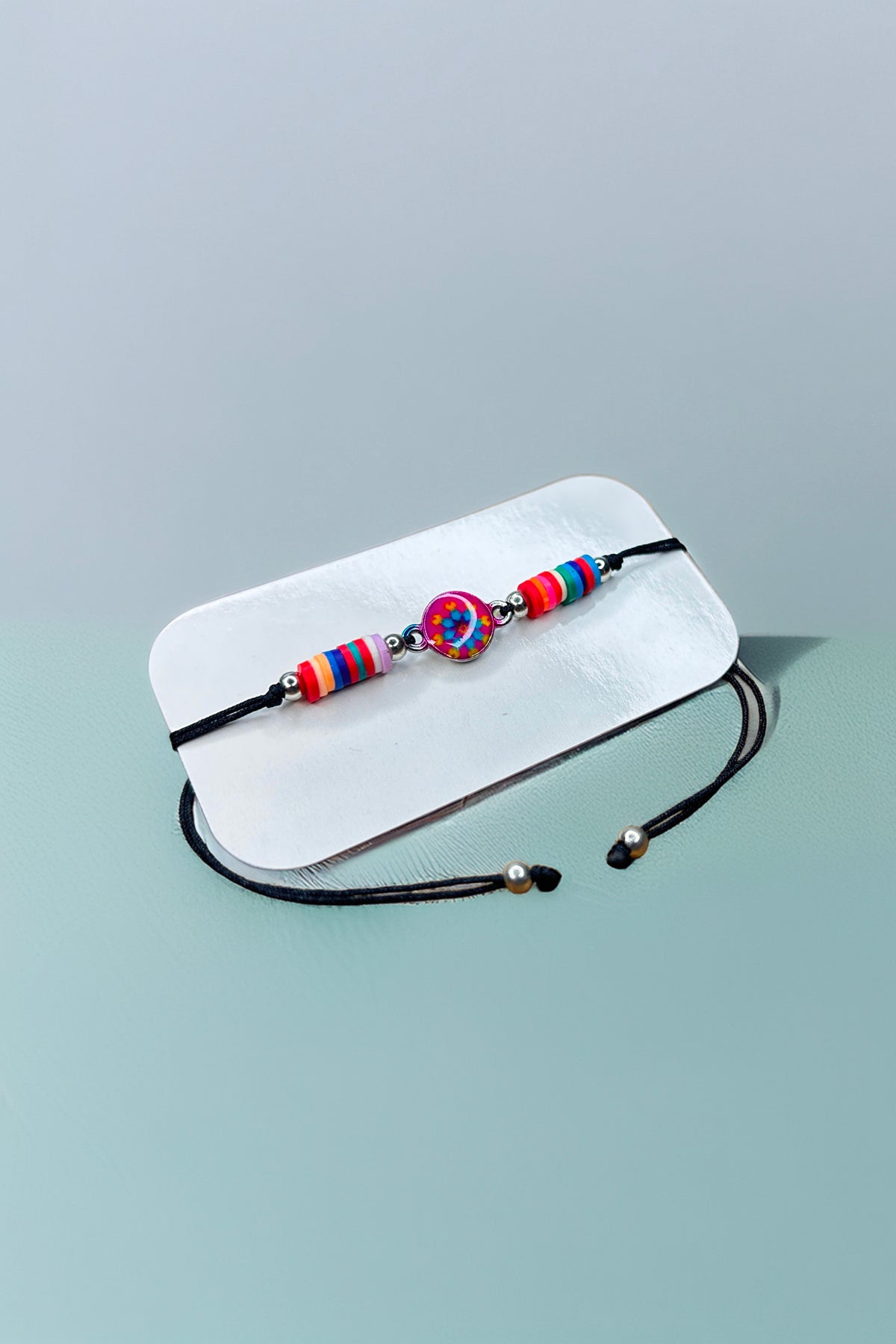 Colorful beaded bracelet with adjustable cord