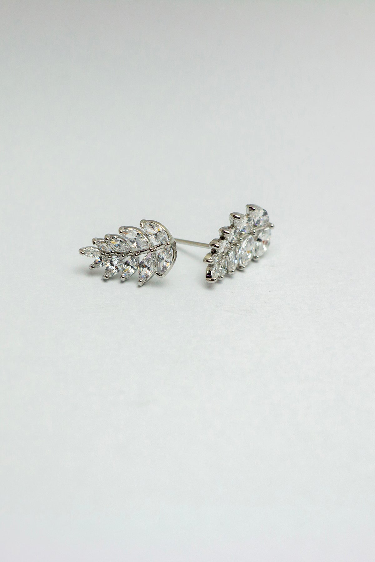 Pair of leaf stud earrings displaying detailed design