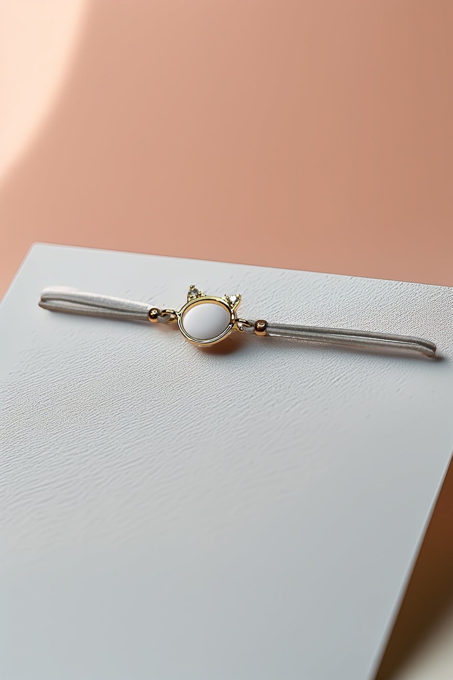 Side angle of cat charm bracelet
