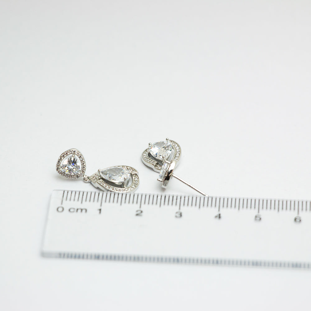 Teardrop earrings with ruler for size reference