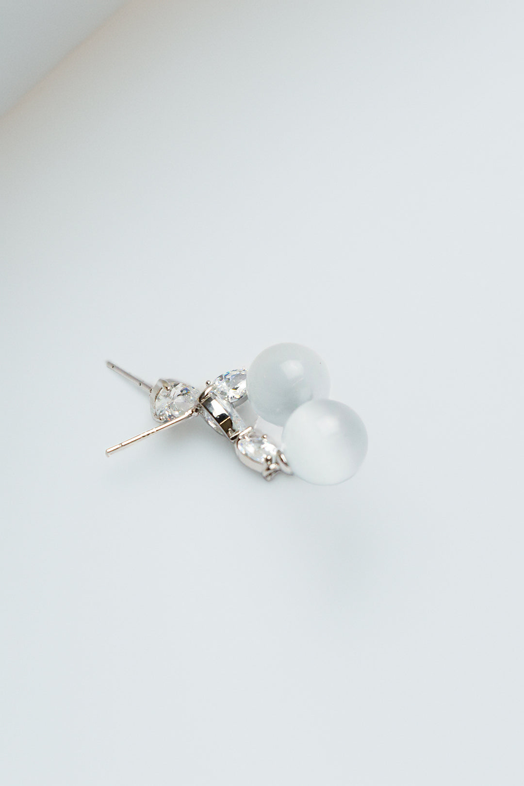 Pair of earrings displayed with a soft focus effect