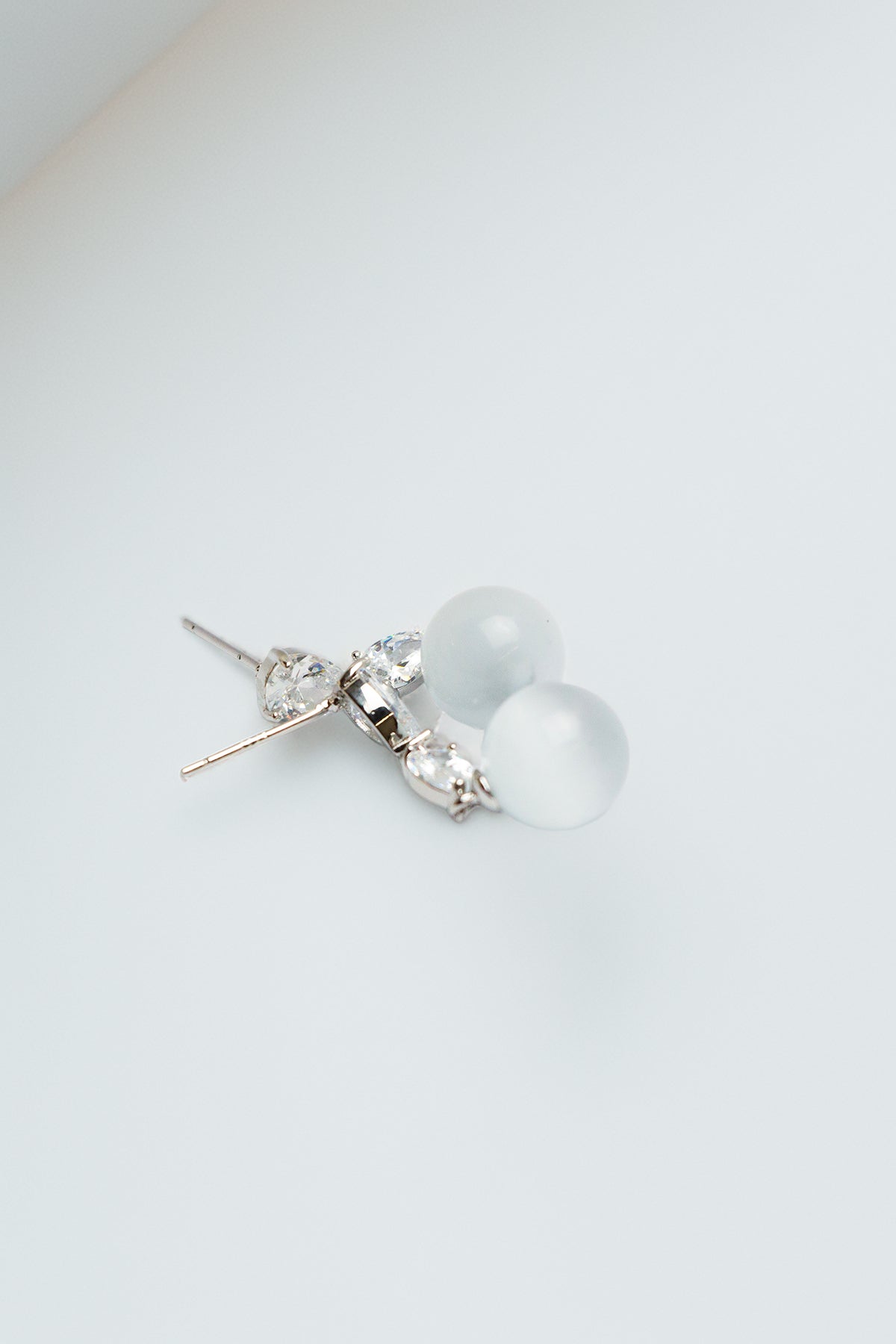 Pair of earrings displayed with a soft focus effect